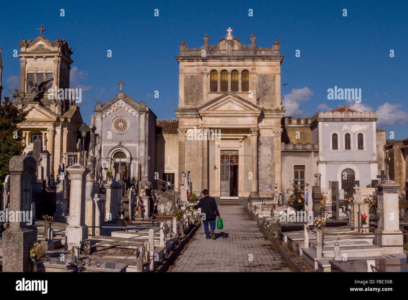 Cemetery in the countryside of Sicily, in the shadow of Mount Etna. Stock Photo