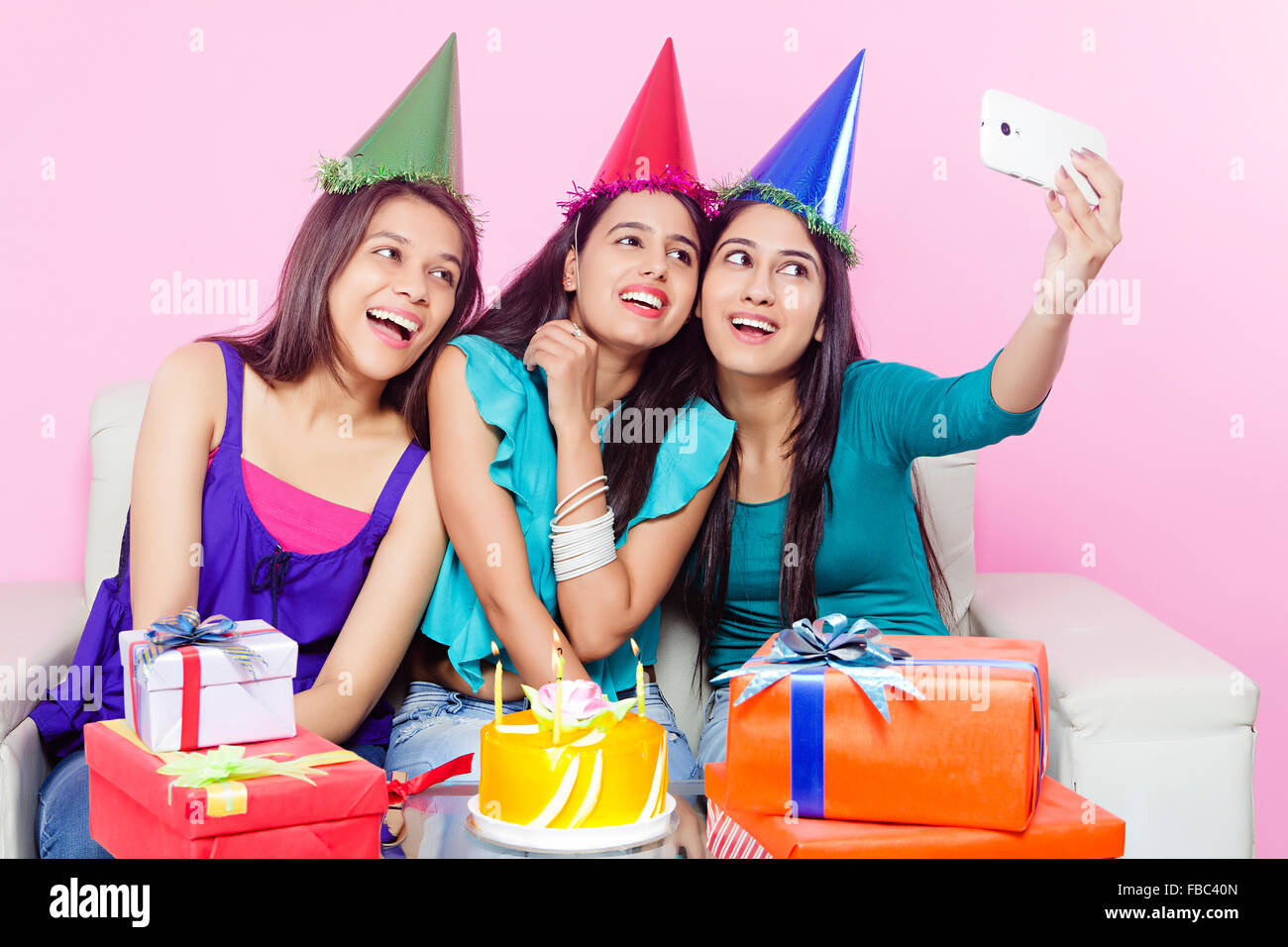 3 indian Young Womans friends Birthday Celebration Selfie  Picture Clicking Stock Photo