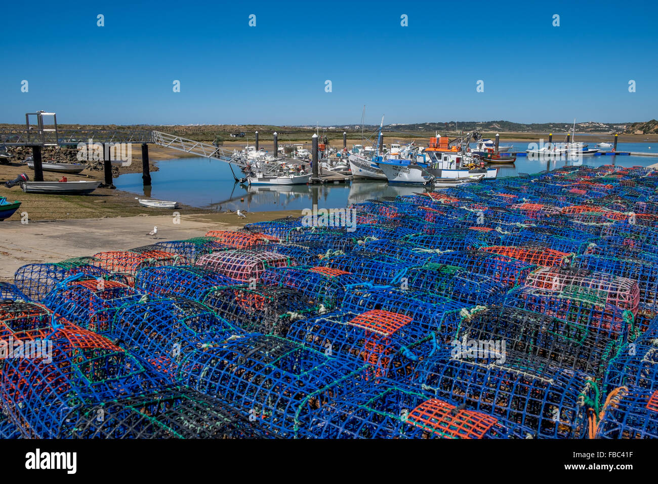 Empty Lobster pots lined up on the quay side, Stock Photo