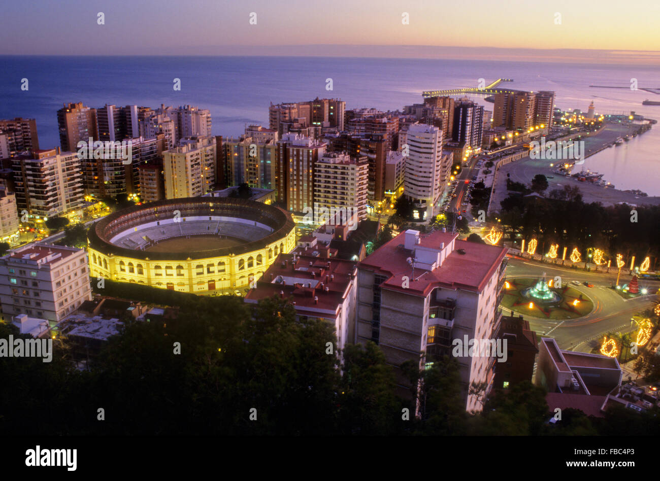 Malaga.Andalusia. Spain: High angle view of a bullring and Malagueta quarter Stock Photo