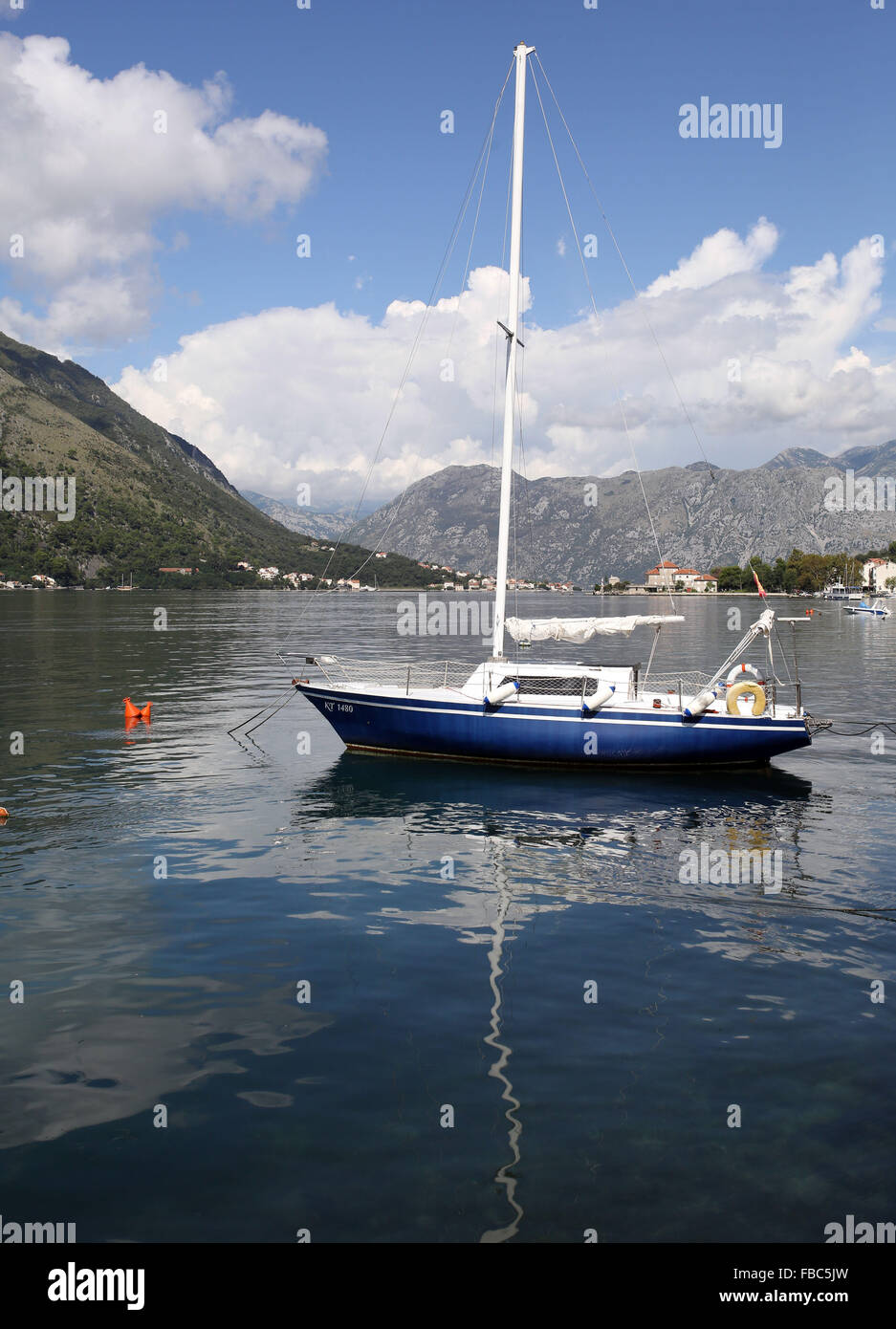 A yacht is pictured in the Bay of Kotor in Montenegró Stock Photo
