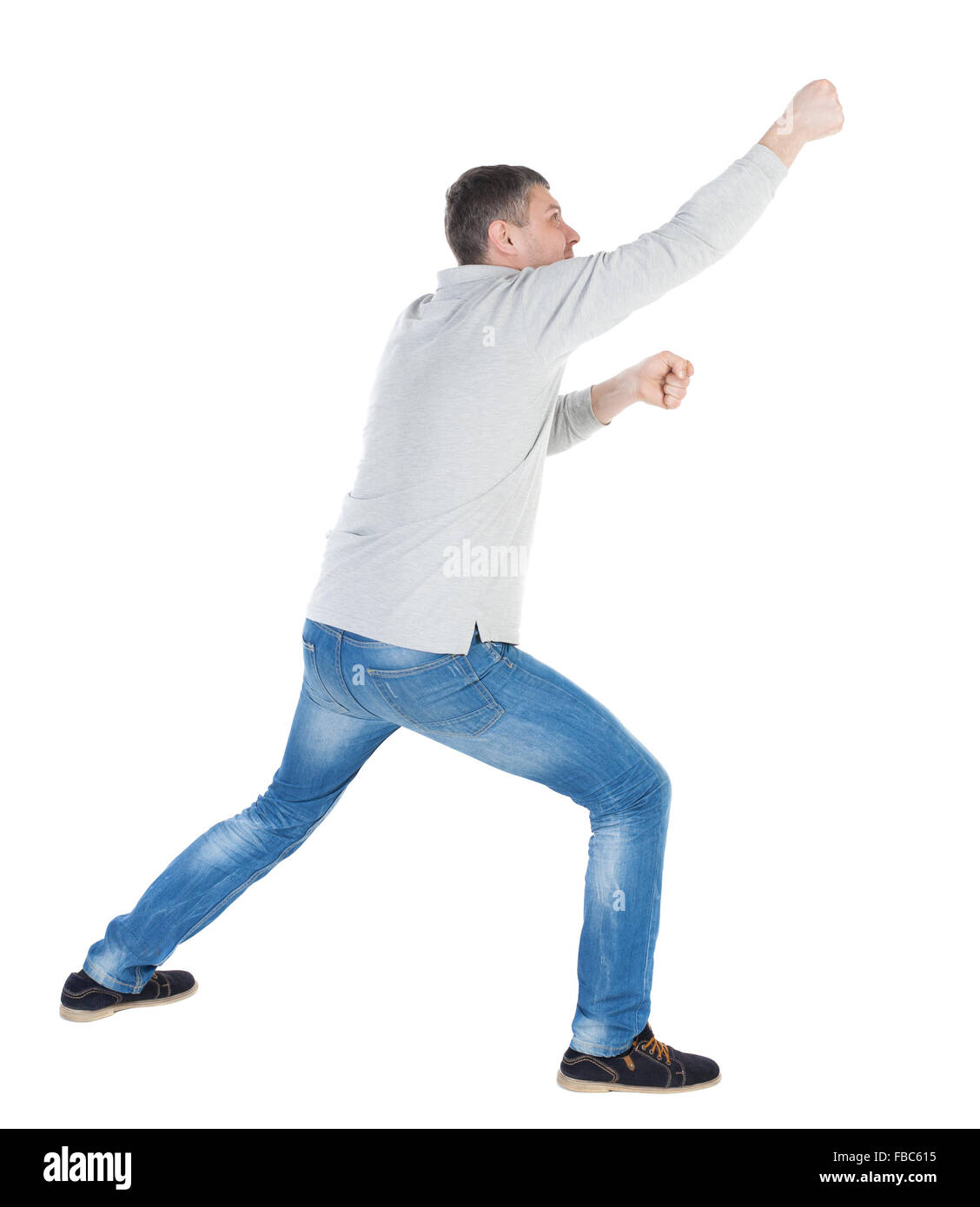 back view of standing man pulling a rope from the top or cling to something.  guy watching. Rear view people collection. backside view of person.  Isolated over white background. resting his foot