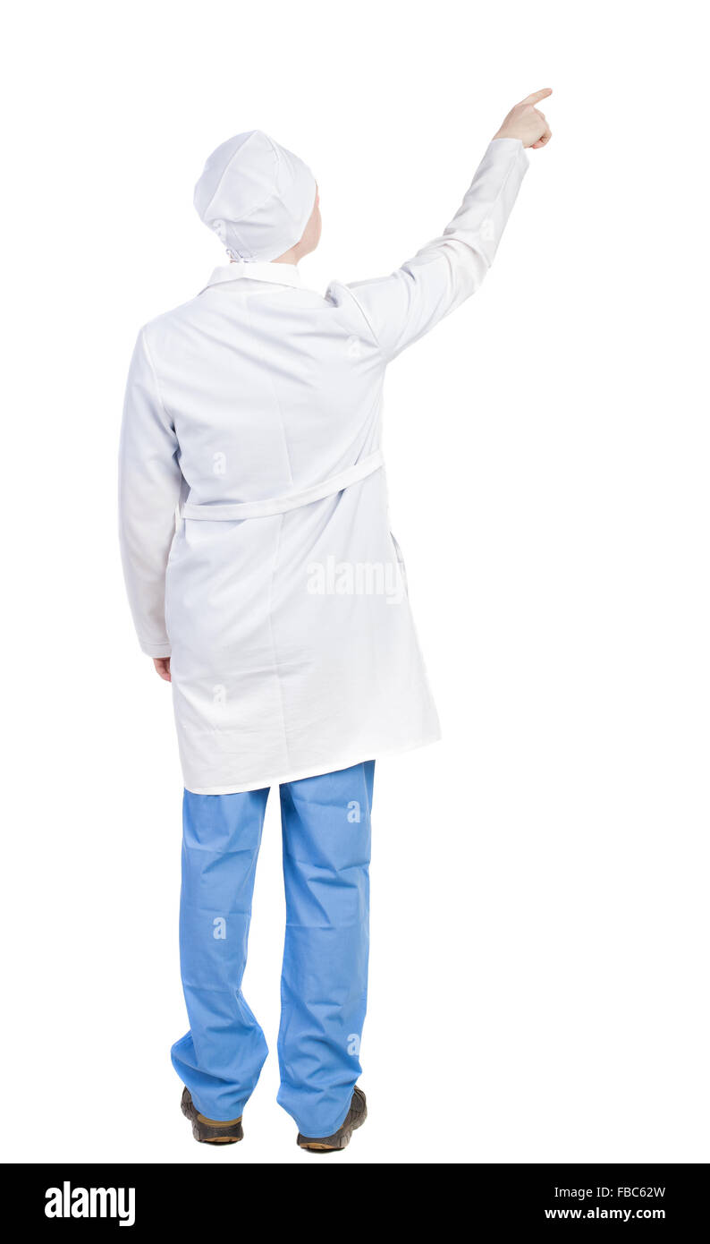 Back view of doctor in robe pointing. Standing young guy. Rear view people collection.  backside view of person.  Isolated over Stock Photo