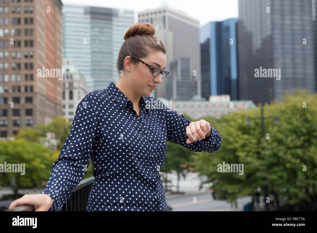 Young professional woman in the city. Photographed in New York City in October 2015. Stock Photo