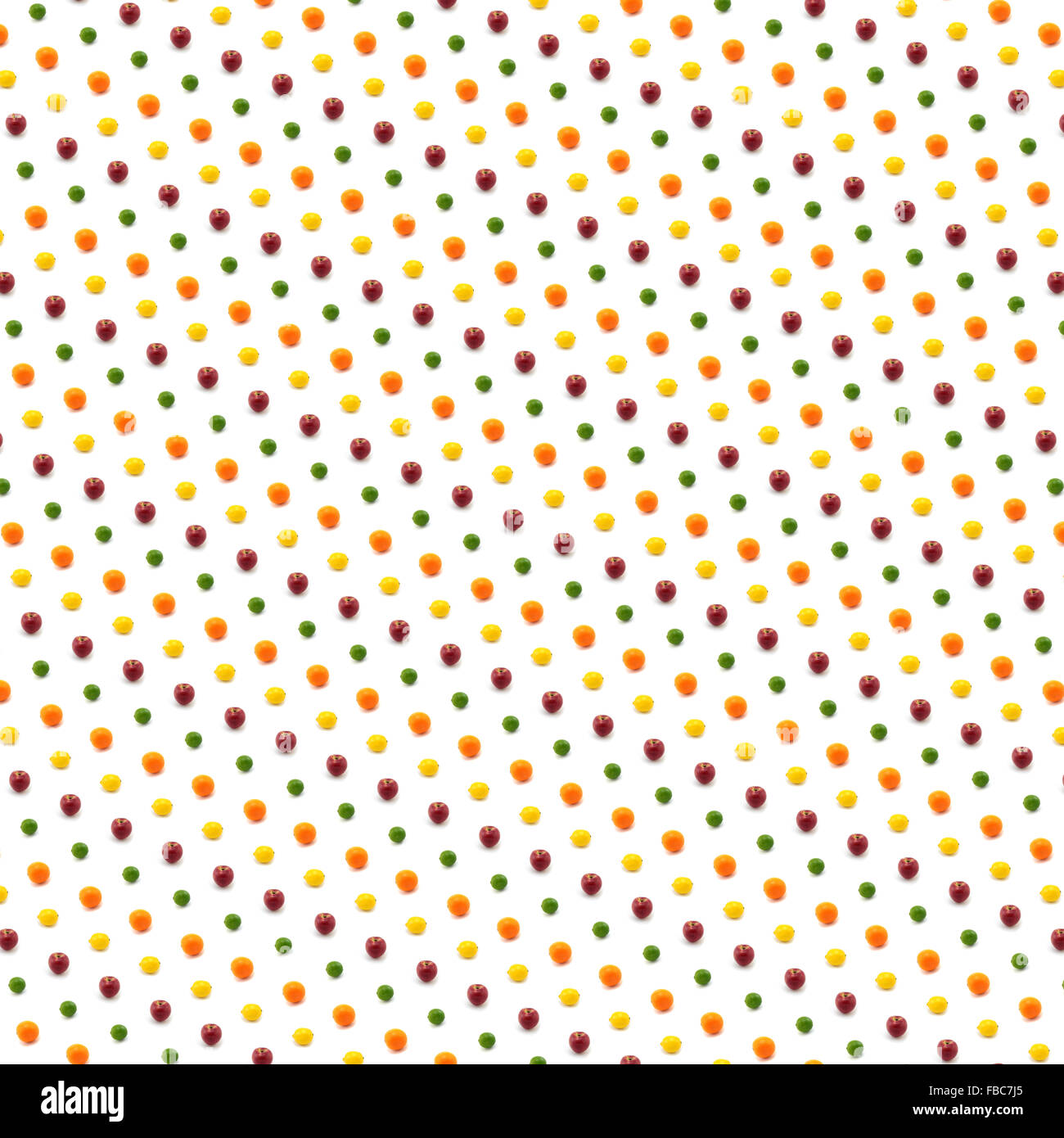 Lemon, lime, orange, and apple photographed against white background in ...