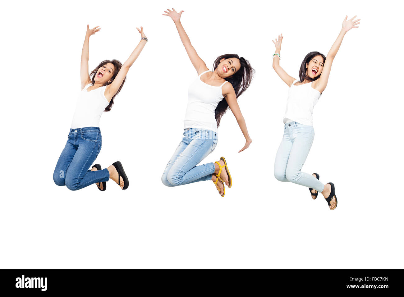 3 indian Beautiful Young Womans Jumping Stock Photo