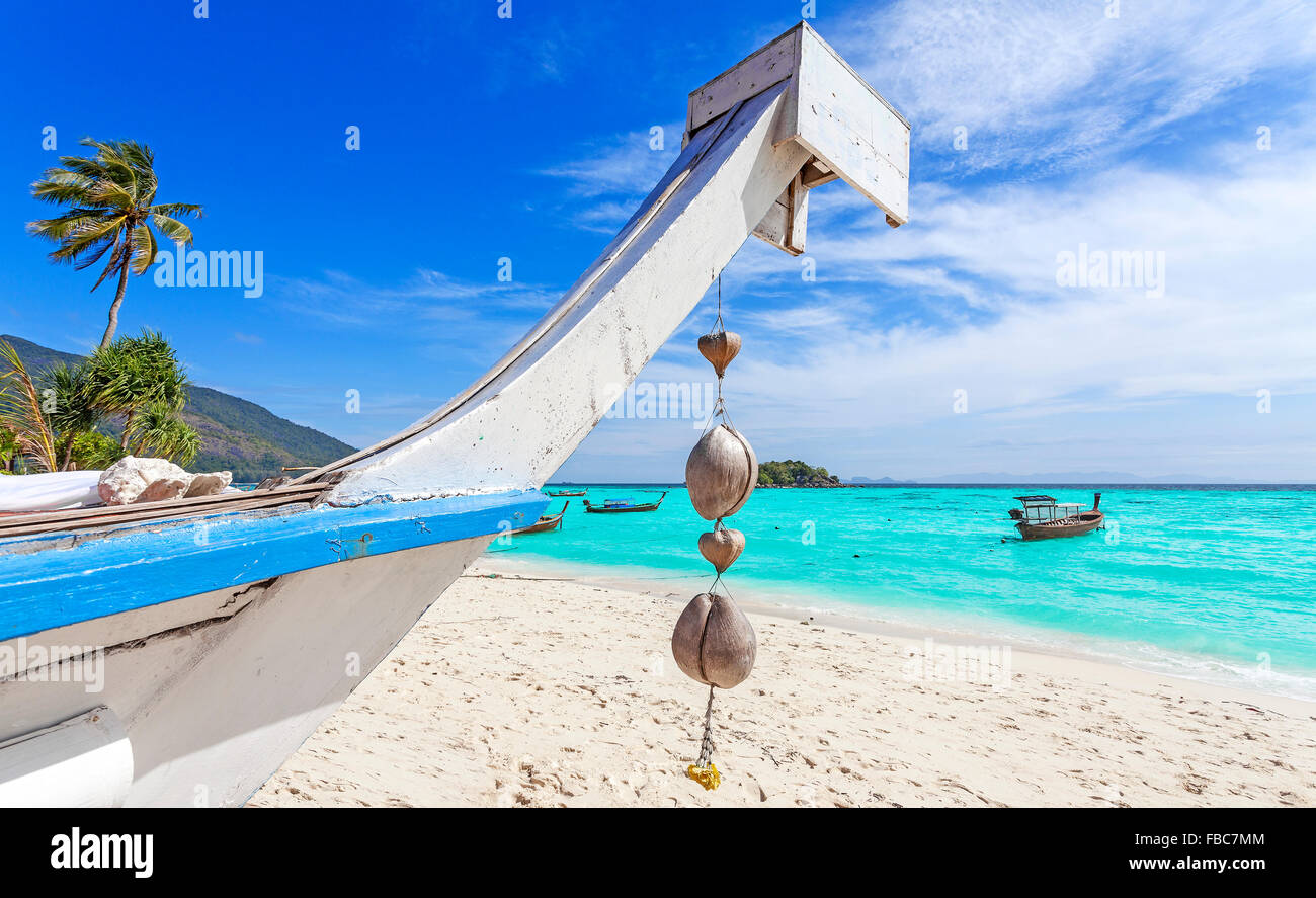 Boat on a tropical island, summer holidays concept. Stock Photo