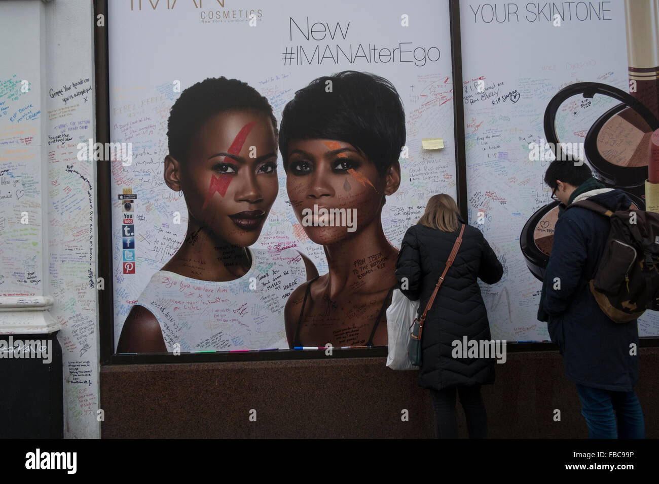 London, UK. 13th Jan, 2016. Fans pay tribute to David Bowie who died of cancer at the age of 69 on January 10th 2016 at a mural in Brixton where he was born. Jimmy C Graffiti. London,13/01/16 Credit:  claire doherty/Alamy Live News Stock Photo