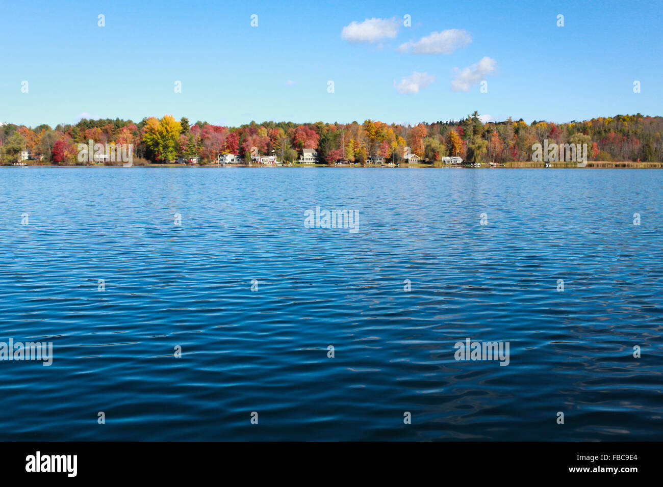 Lake side houses in the fall photographed in Lee MA in October 2014. Stock Photo