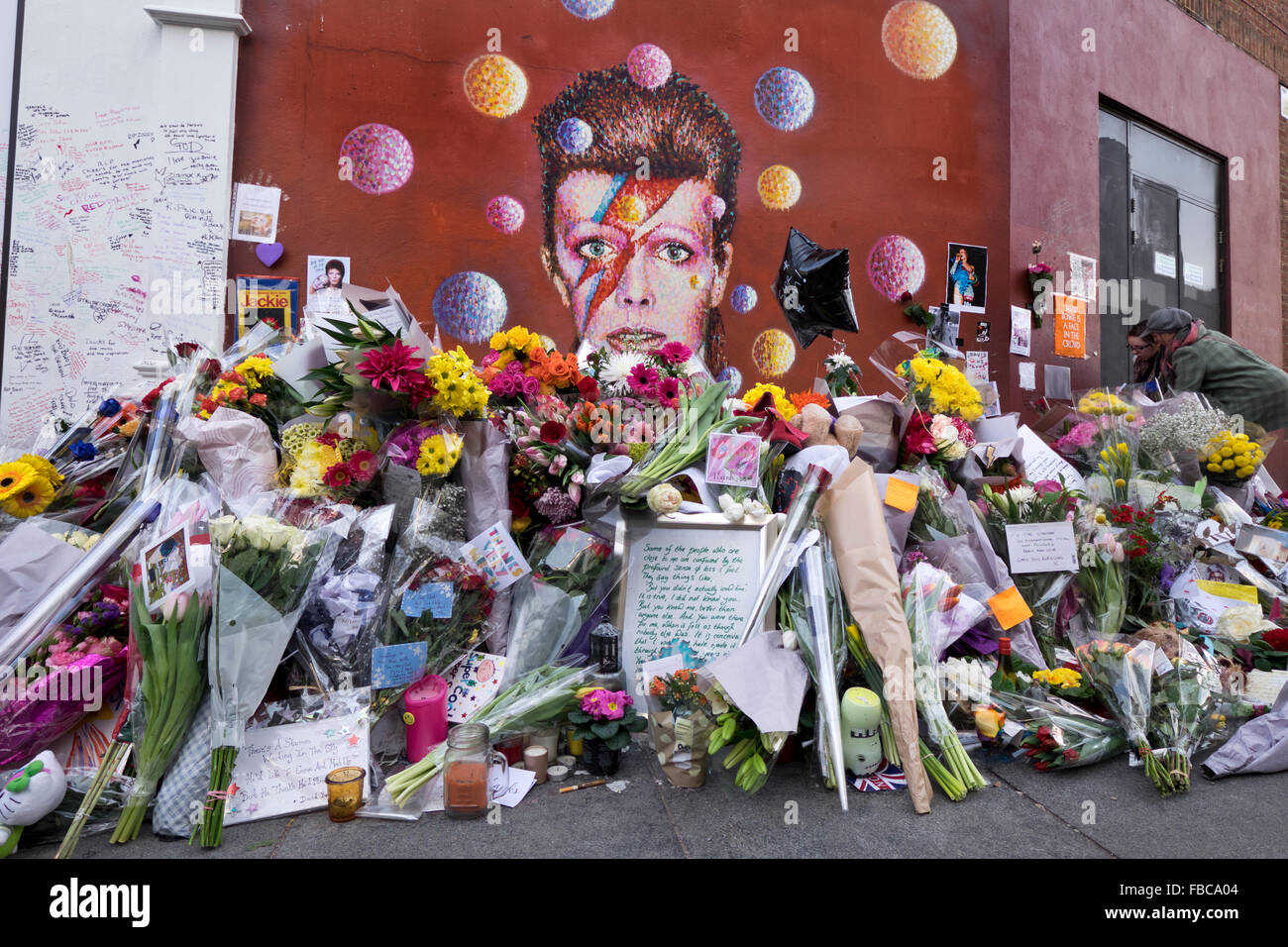 David Bowie memorial next to his mural in Brixton South London Stock Photo