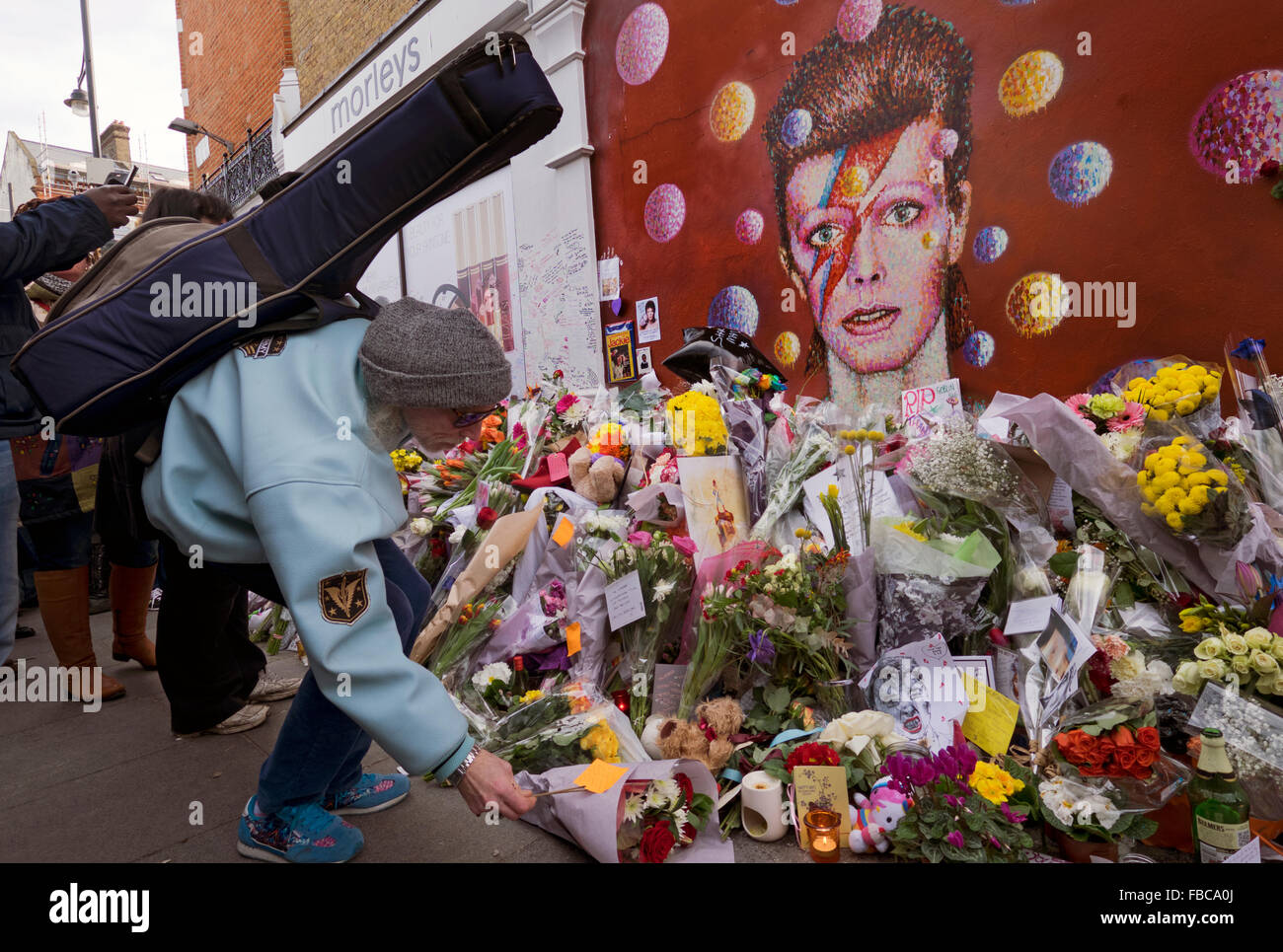 David Bowie memorial next to his mural in Brixton South London Stock Photo