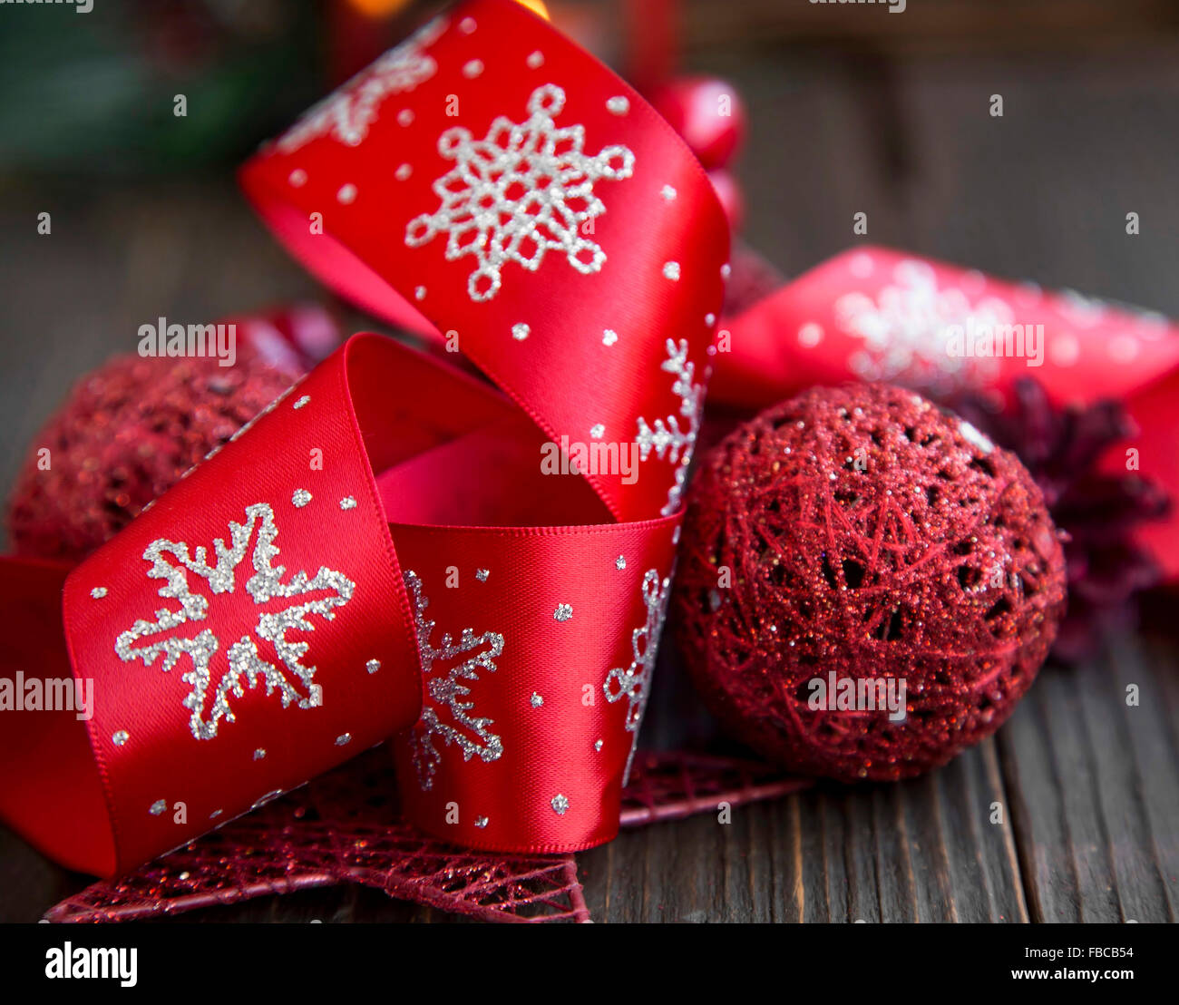 Festive Red Christmas Decoration with Ribbon and Glitter Star Stock Photo