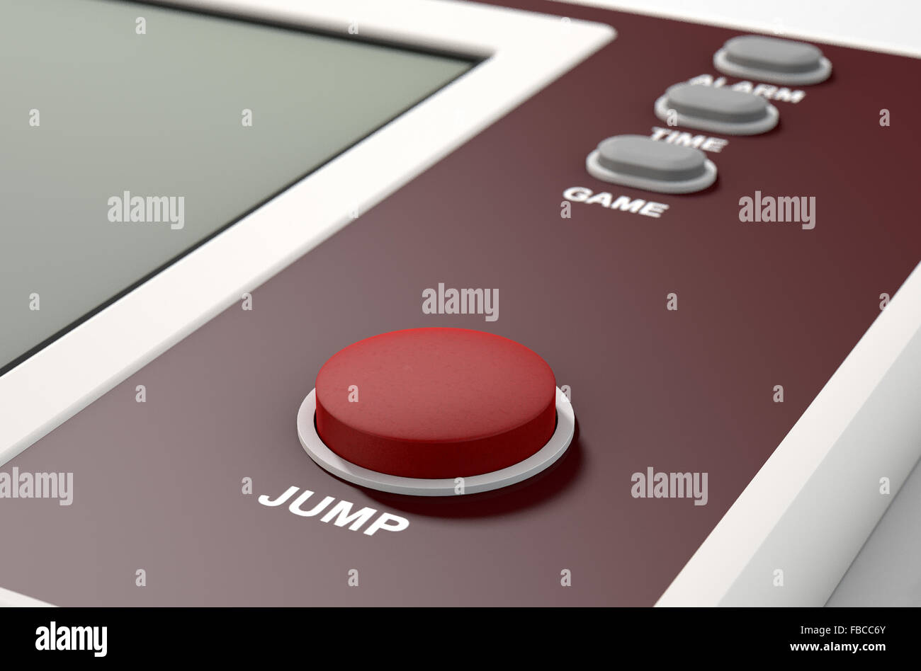 A vintage handheld video game console with a blank screen on an isolated white background Stock Photo