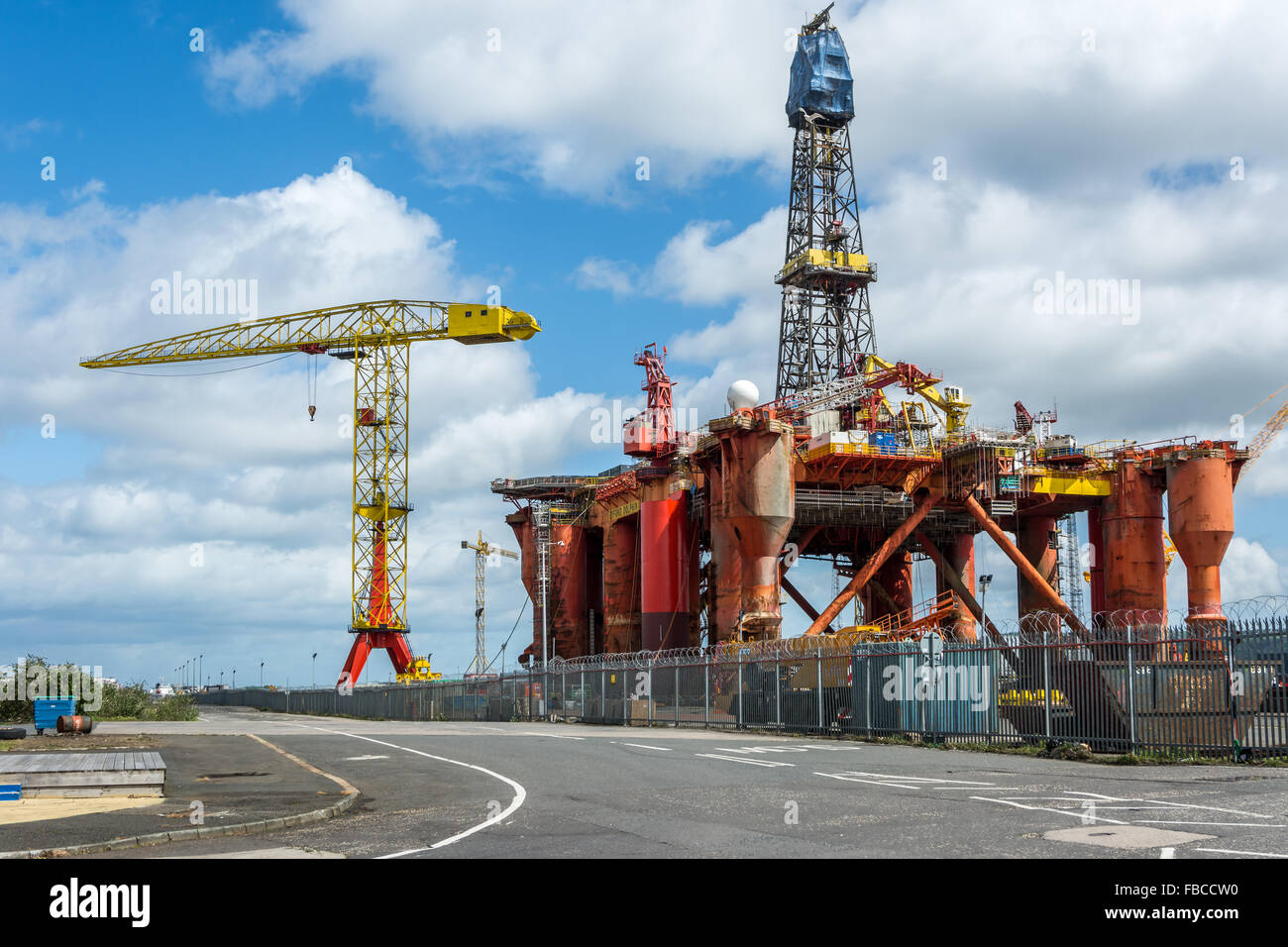 Huge oil rig in for repair work in Harland and Wolff shipyard Belfast where he Titanic was built Stock Photo