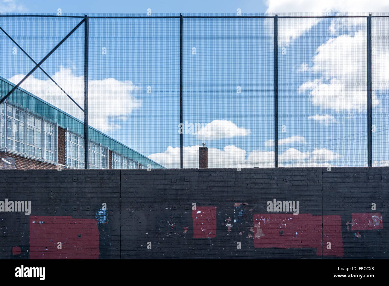 A peace wall dividing the Nationalist Short Strand area from Loyalist Easy Belfast Stock Photo