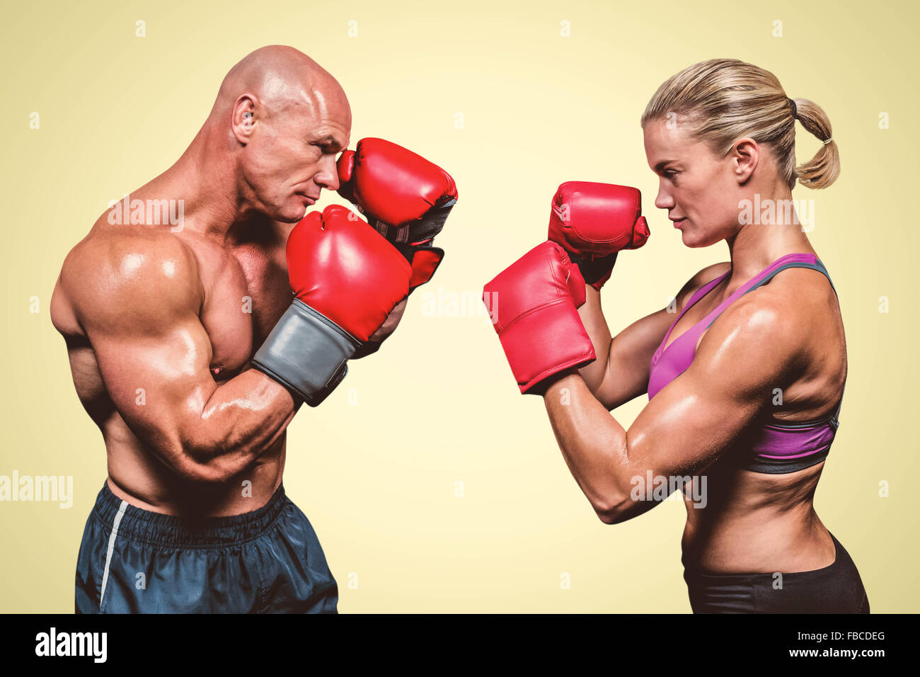 Composite image of side view of boxers with fighting stance Stock Photo
