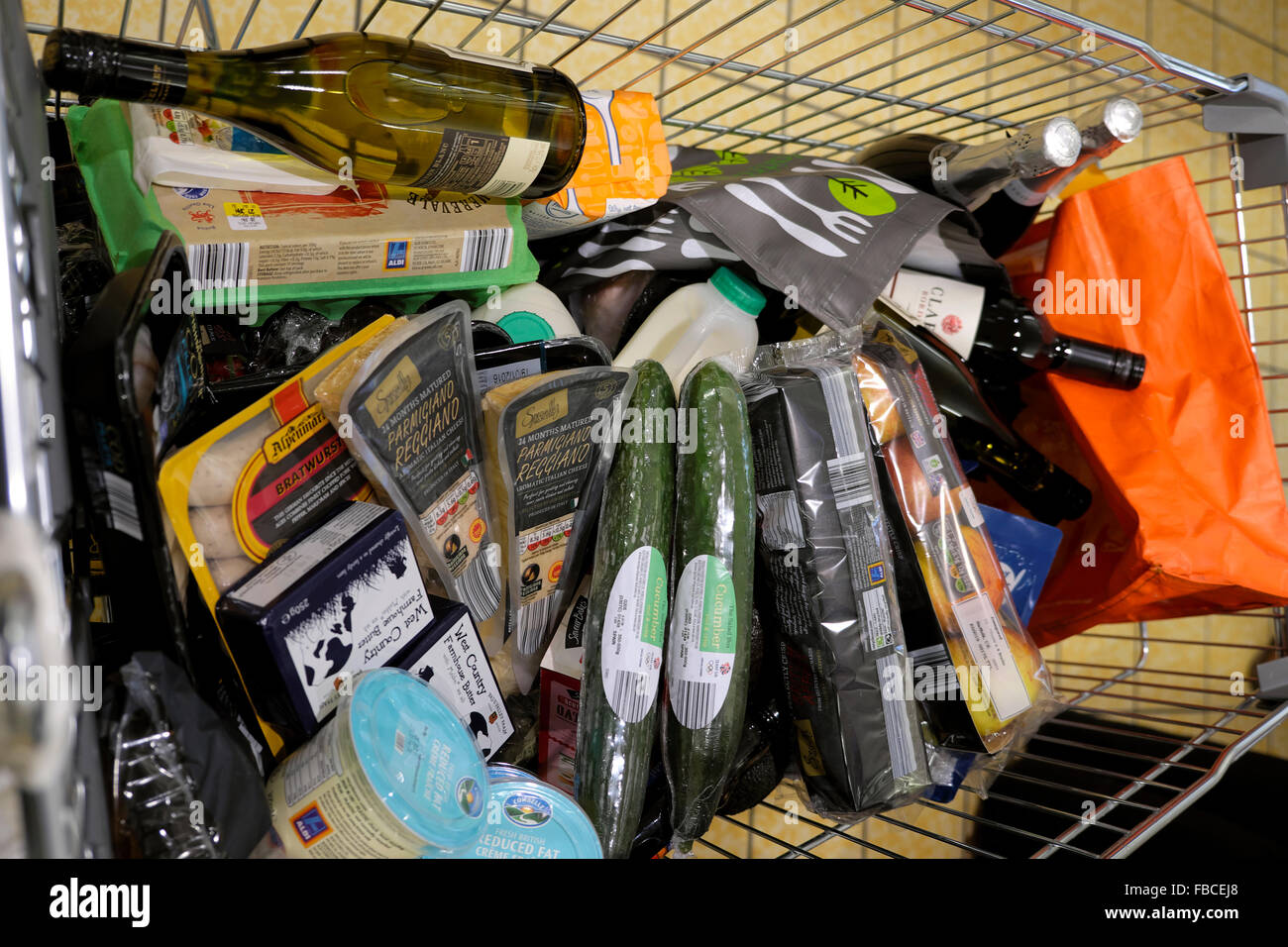 A full supermarket trolley at Aldi's supermarket with food and wine