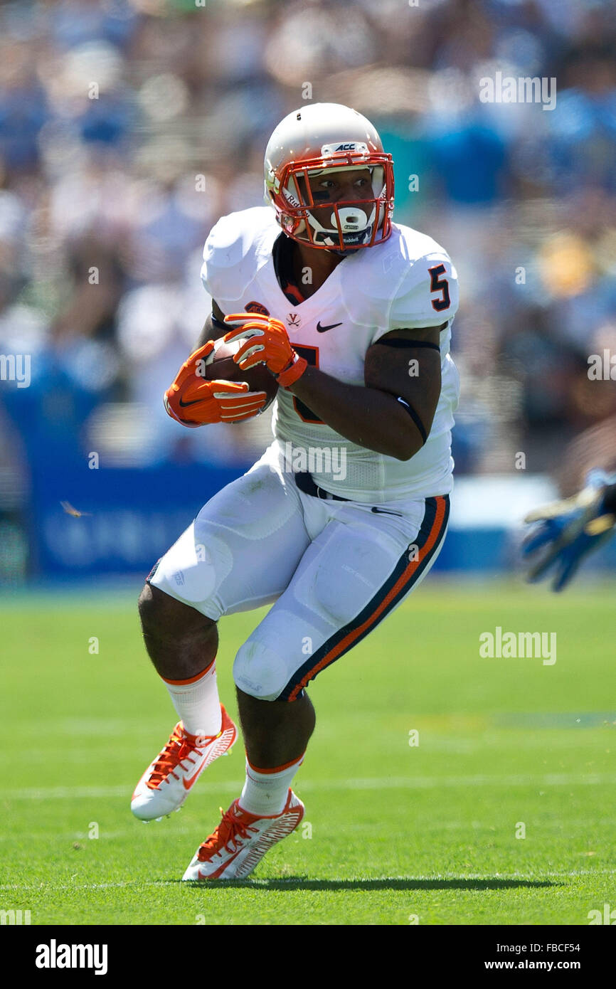 Running back Albert Reid #5 of the Virginia Cavaliers rushes up field against the UCLA Bruins during the first quarter at the Stock Photo