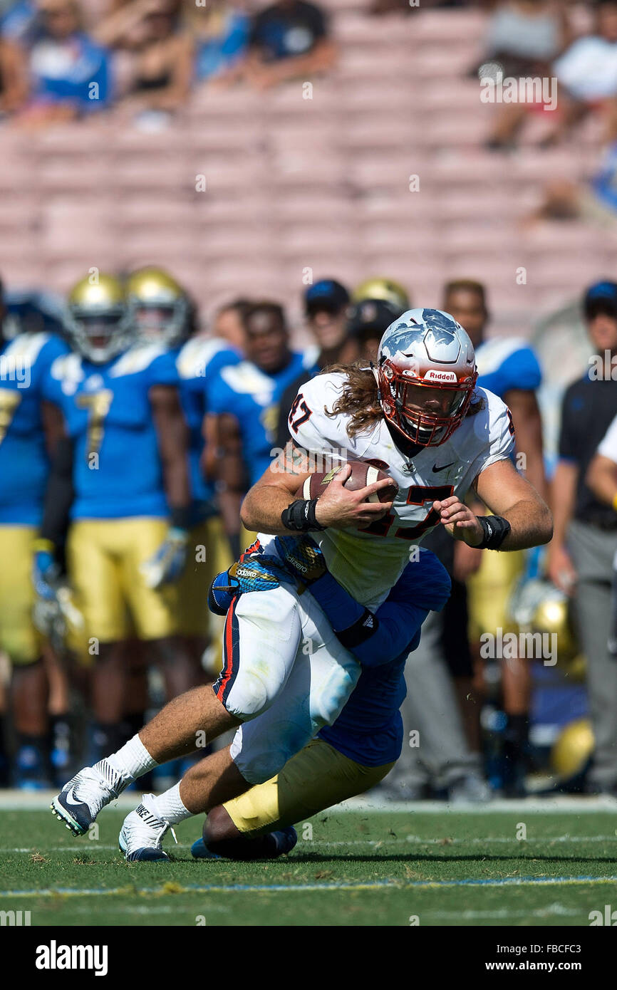 Fullback Vincent Croce #47 of the Virginia Cavaliers rushes up field against the UCLA Bruins during the fourth quarter at the Stock Photo