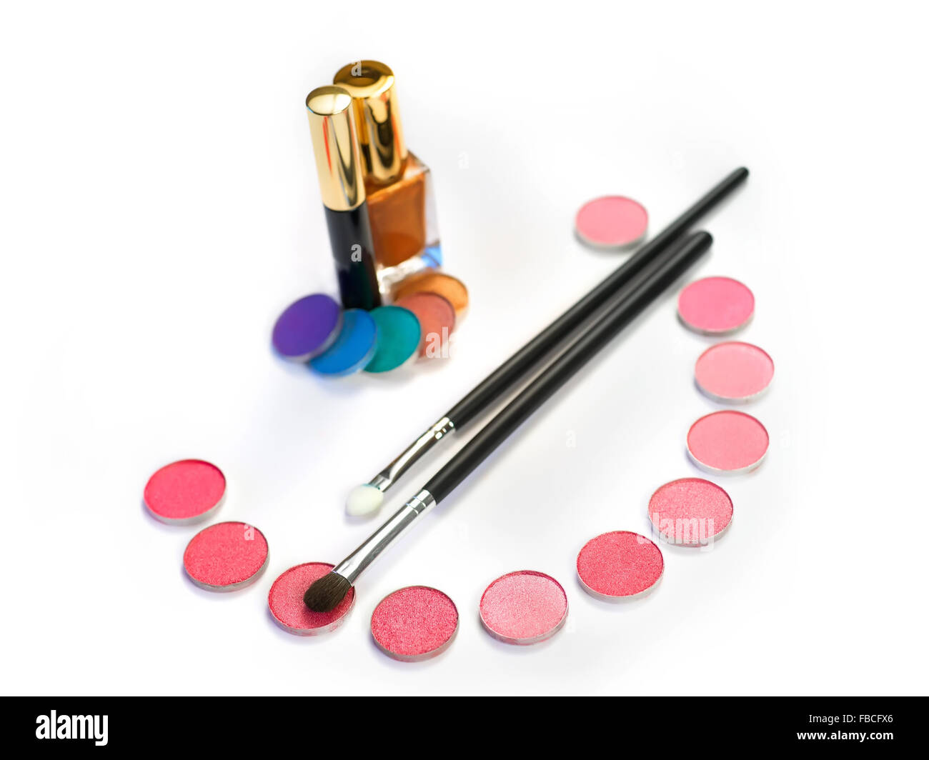 Stil life with eye shadows and make-up brushes on white Stock Photo