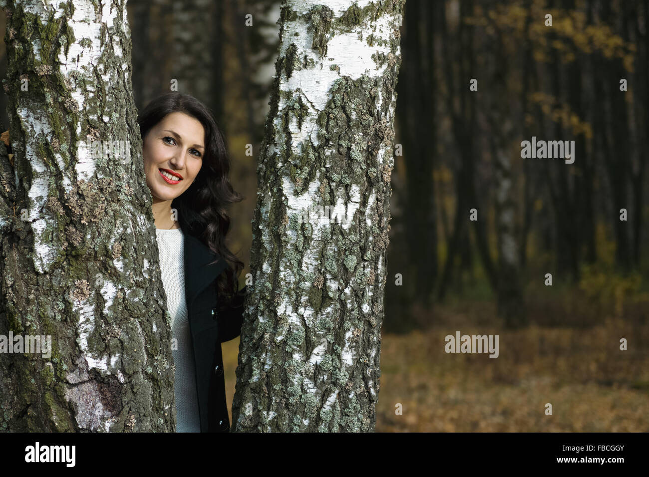 Portrait of beautiful smiling woman on the nature Stock Photo - Alamy