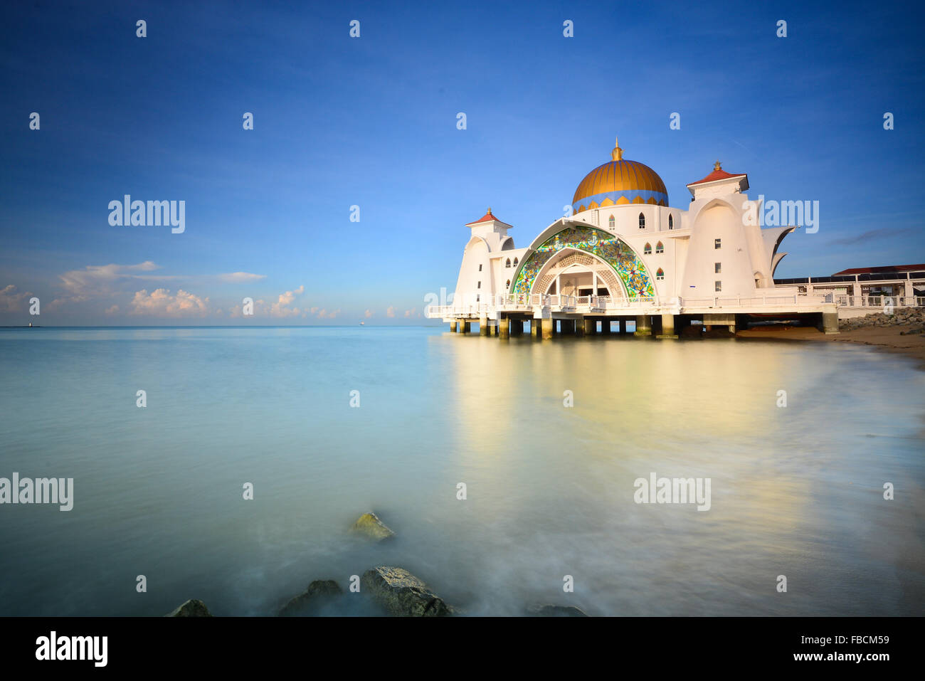 Beautiful Malacca Straits Mosque located at Malacca Island against blue sky Stock Photo