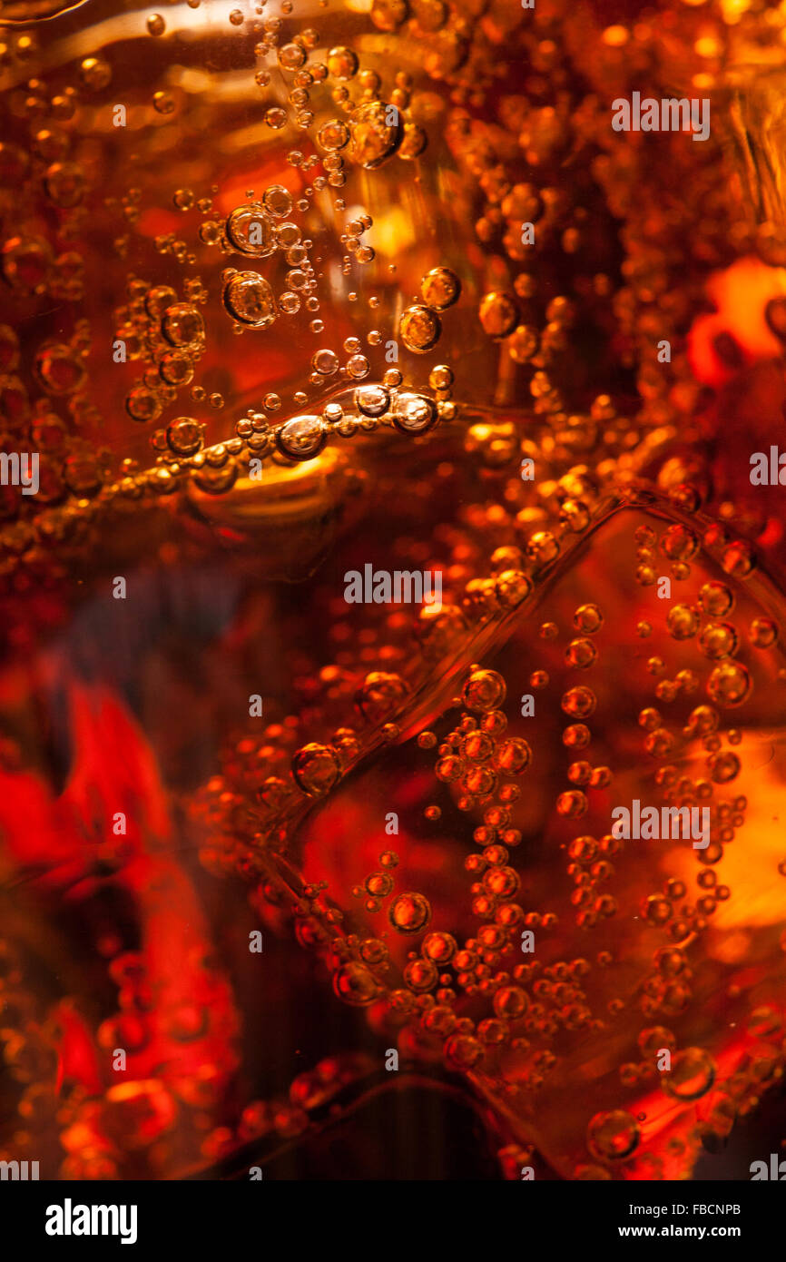 Close up view of the ice cubes in cola Stock Photo - Alamy