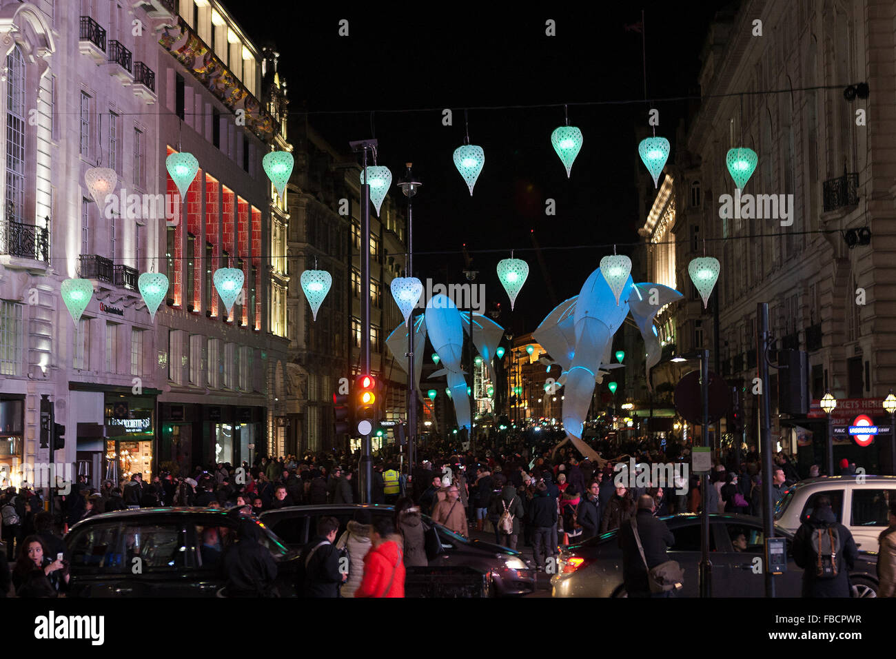 London, UK. 14th January, 2016. Lit by LEDs, brightly coloured fish Created for the Fete des Lumires Lyon, illuminating the night sky along Piccadilly London UK Credit:  martyn wheatley/Alamy Live News Stock Photo