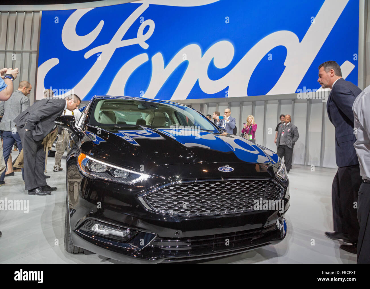 Detroit, Michigan - The Ford Fusion plug-in hybrid is introduced at the North American International Auto Show. Stock Photo