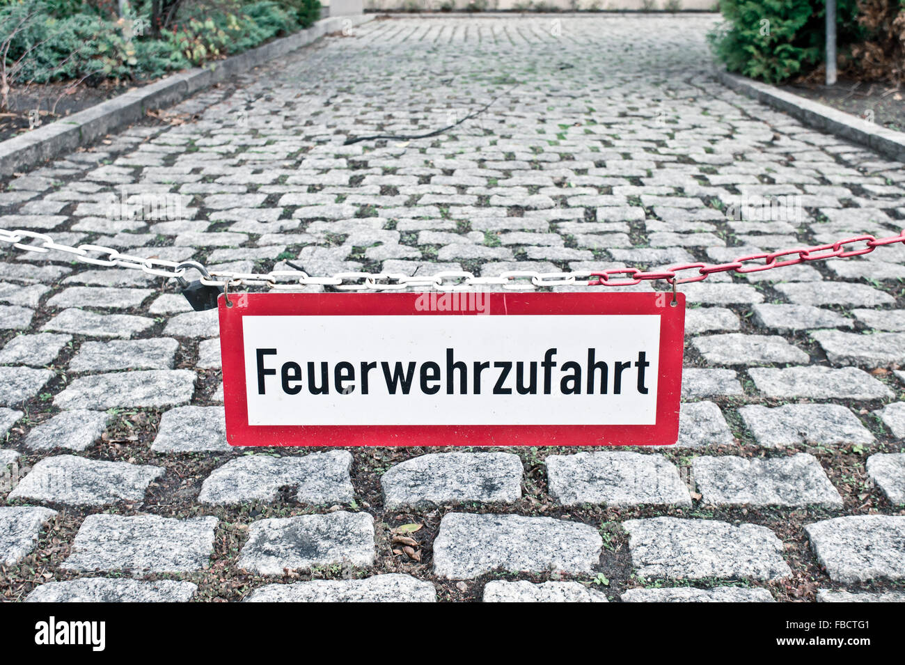 A warning sign in German for a fire escape route Stock Photo