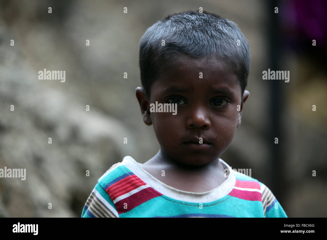 Poor boy hi-res stock photography and images - Alamy