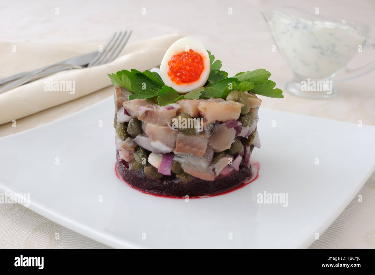 Herring tartare with capers and dill cream sauce Stock Photo