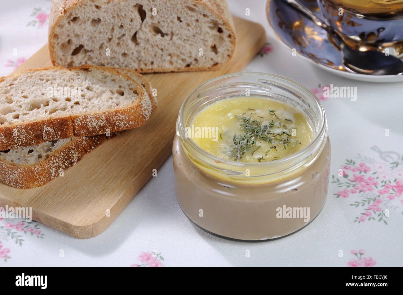 Chicken liver pate on bread and in jar Stock Photo Alamy