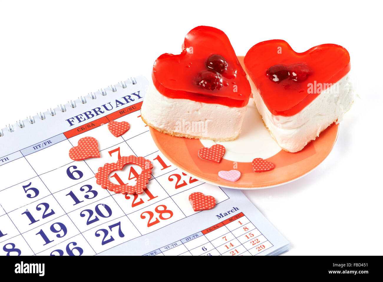 Two jelly heartshaped cakes and calendar Valentines Day Stock Photo
