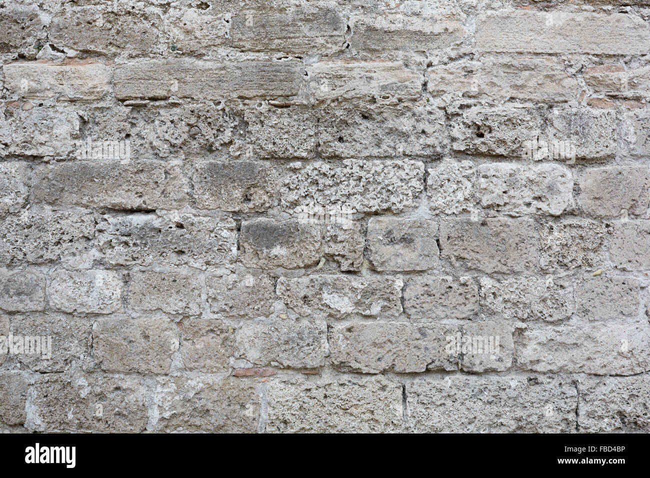 Gray, weathered stone blocks wall texture background Stock Photo