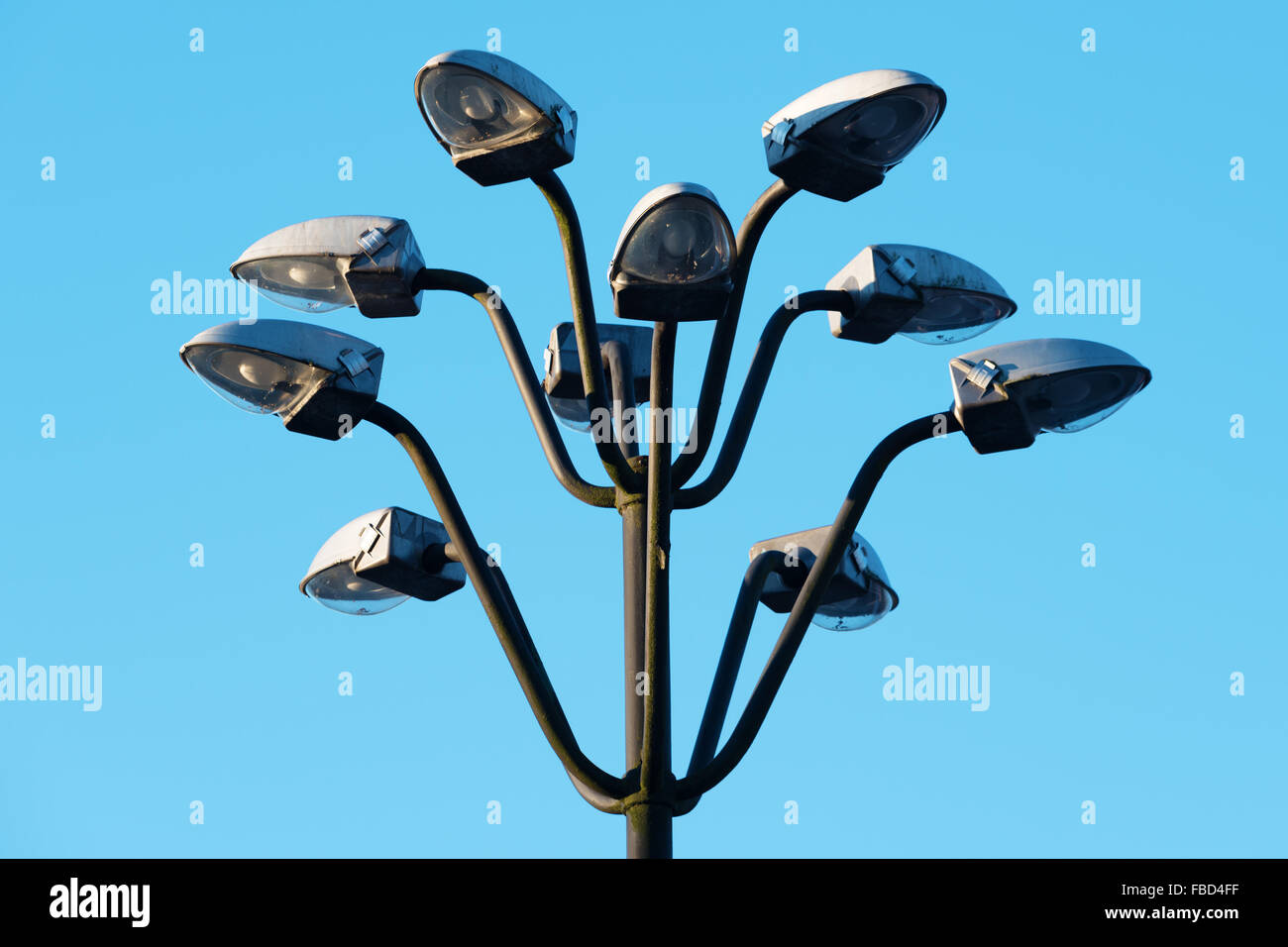 Karlskrona, Sweden - January 13, 2016: Designer streetlamp against blue sky. No lights are on. Thorn logo on plastic casing. Sta Stock Photo