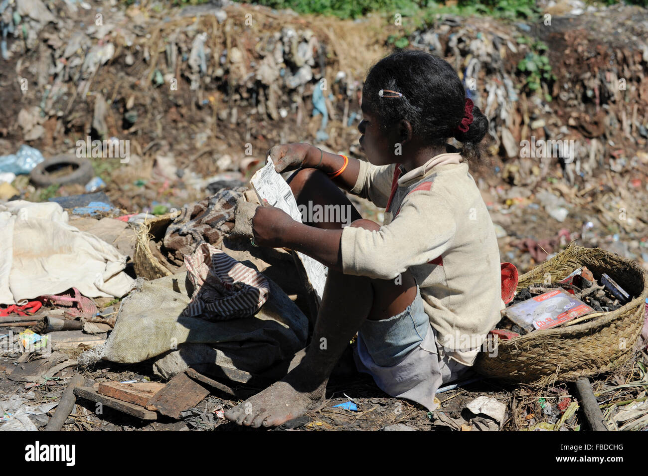 MADAGASCAR Antananarivo, dumping site, people live from waste picking, children work as waste picker Stock Photo