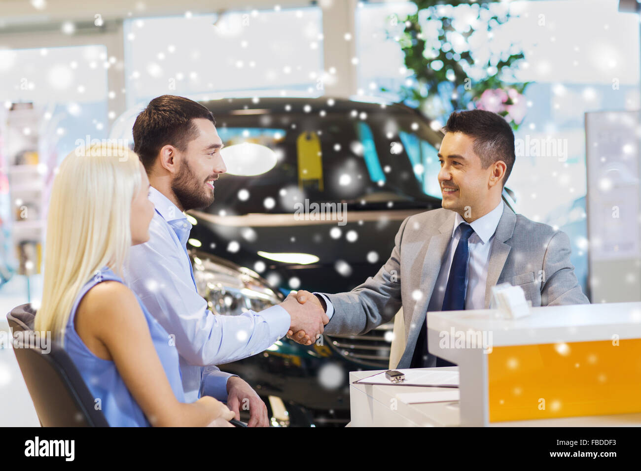 happy couple making deal with car dealer at salon Stock Photo Alamy