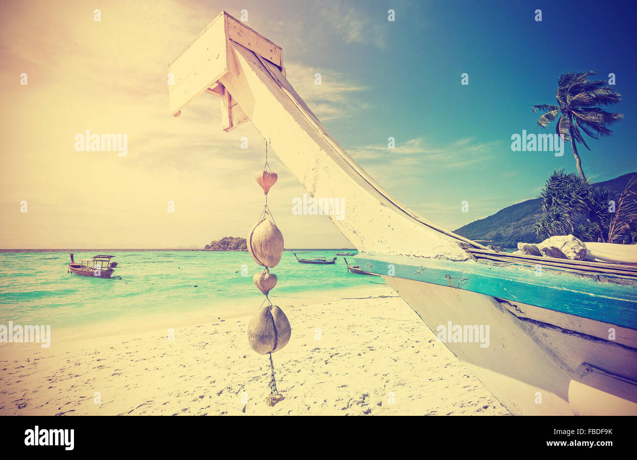 Retro stylized tropical beach, summer holidays concept. Stock Photo