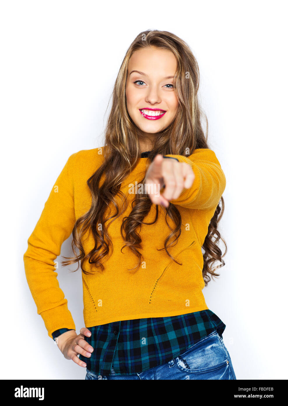 happy young woman or teen pointing finger on you Stock Photo