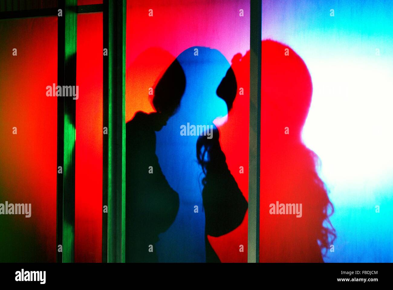 Shadow Of Trapped Women In Prison Stock Photo
