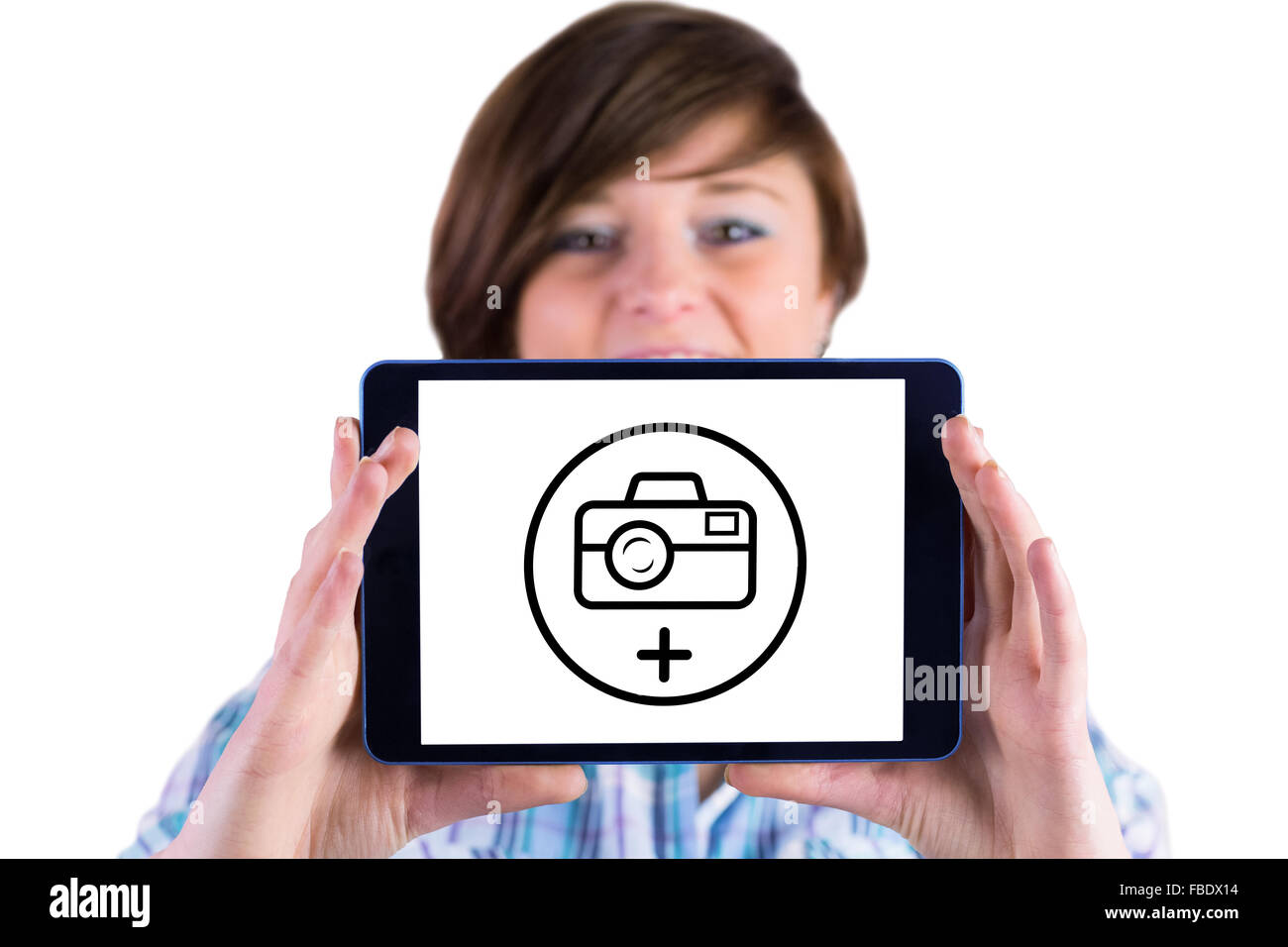 Composite image of portrait of woman showing digital tablet Stock Photo