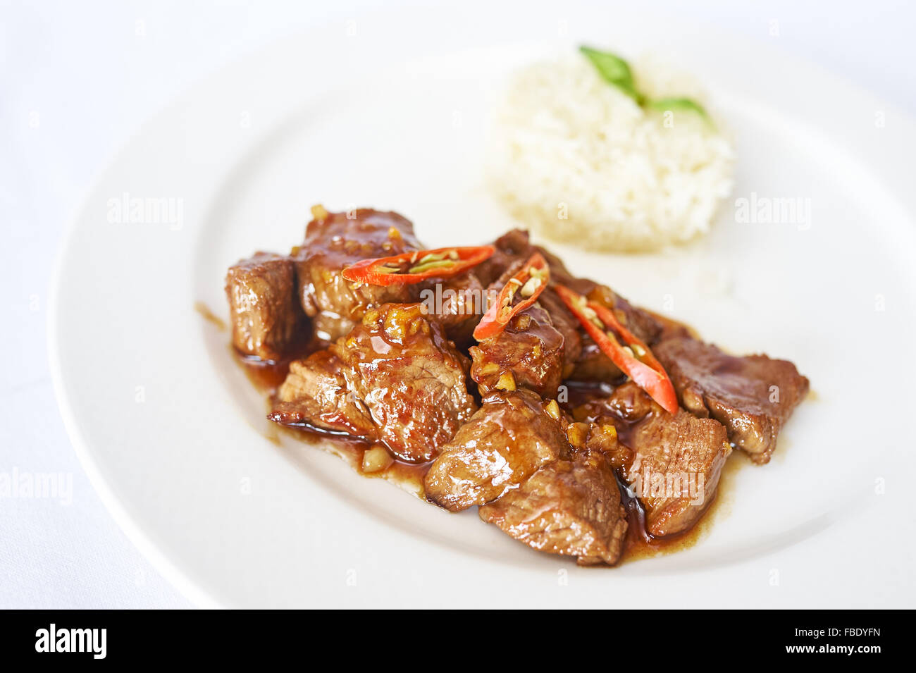Cut beef in oyster sauce with rice Stock Photo Alamy