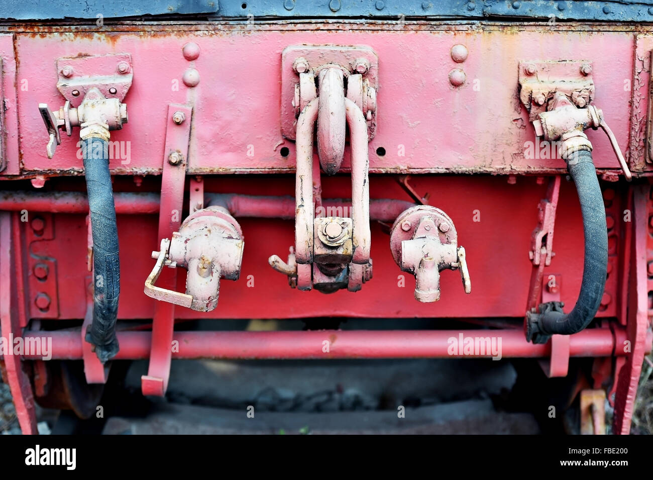 Industrial shot with links wagon mechanism of an old steam train Stock Photo