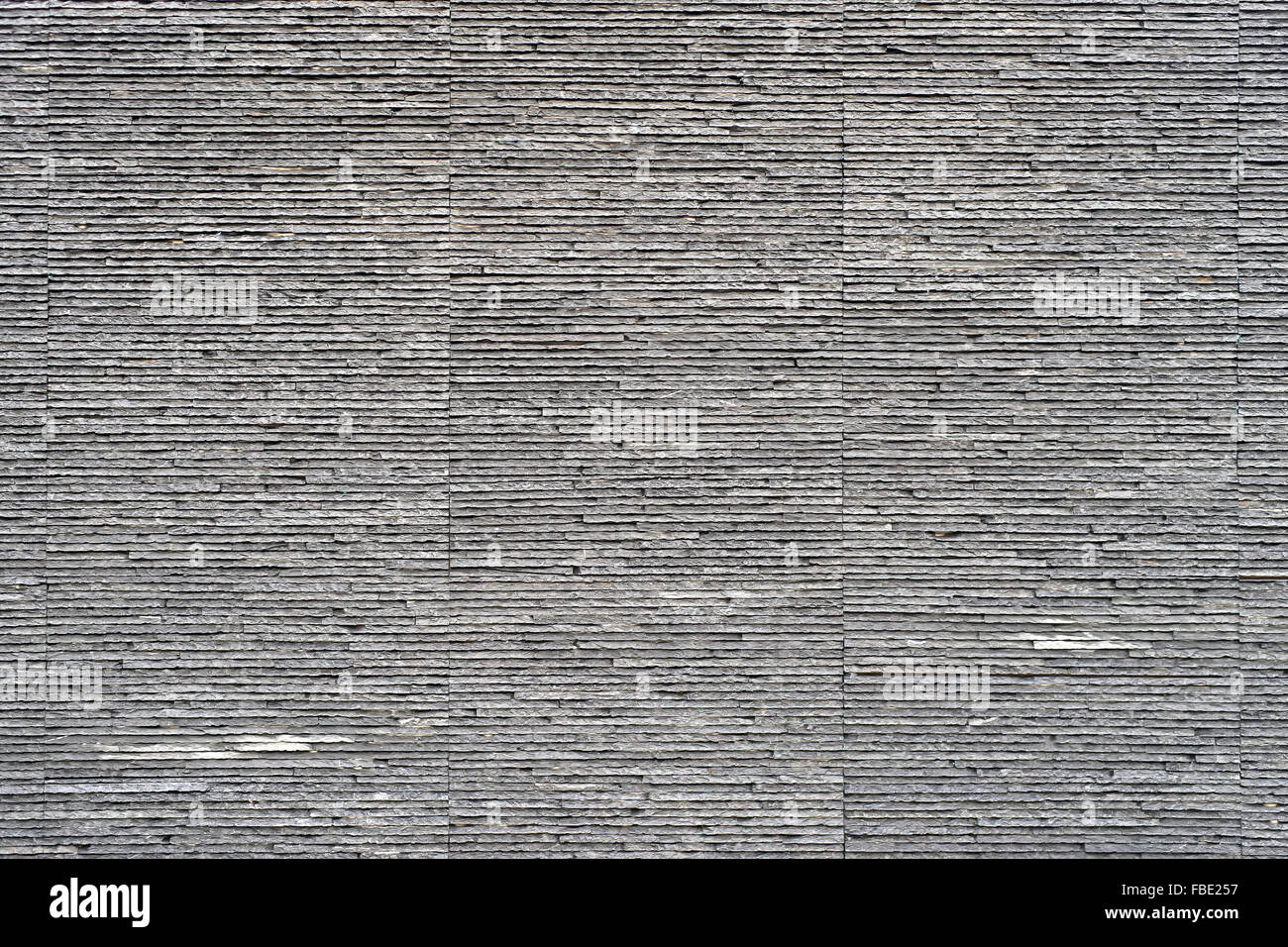 Rough pebble stone wall hi-res stock photography and images - Alamy