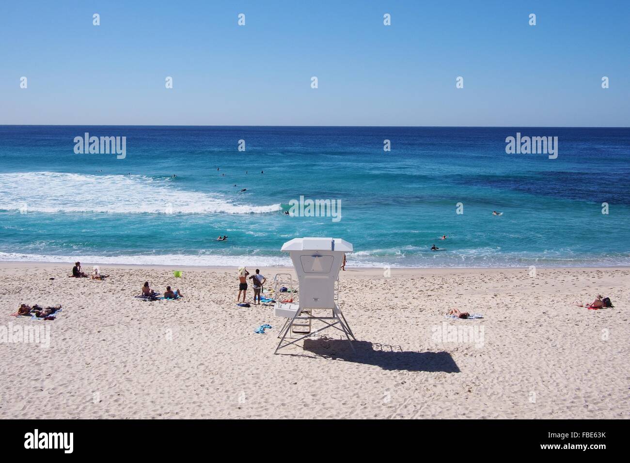 High Angle View Of People Relaxing At Bronte Beach Against Clear Blue Sky Stock Photo