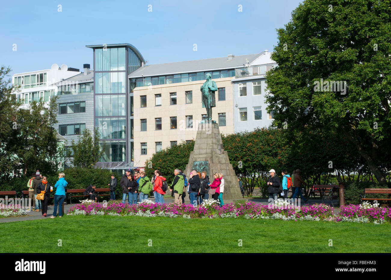 Reykjavik Iceland downtown colorful park with flowers in city center in summer sunshine Stock