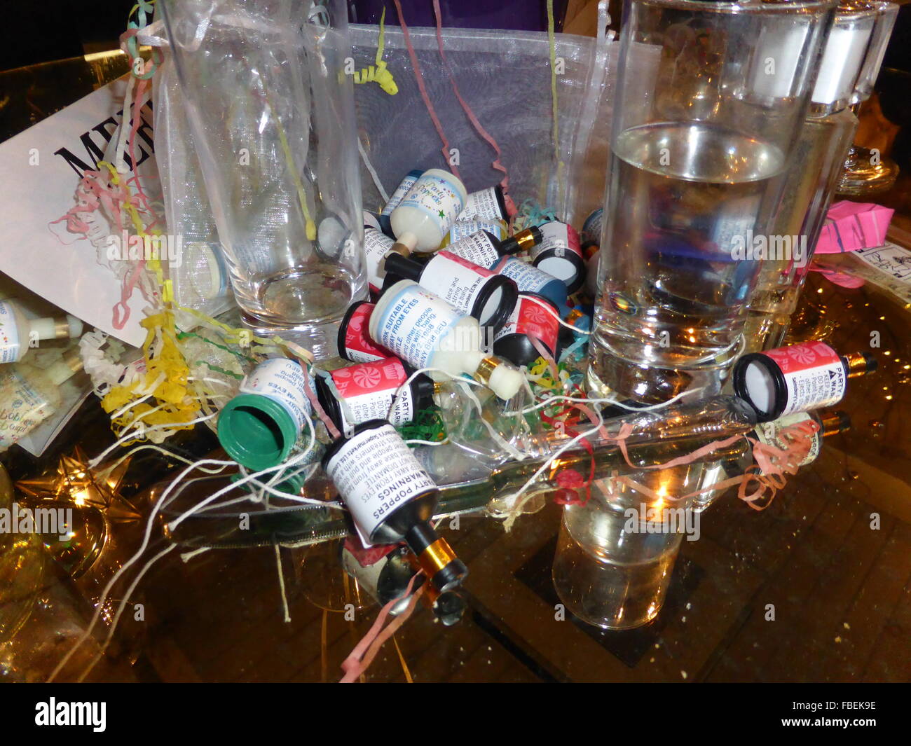Party Popper & Drinks at New Year Stock Photo