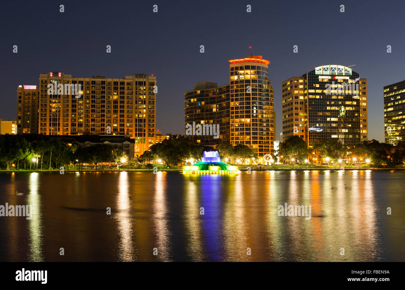 Orlando Florida Lake Eola skyline twilight night colored lights statue
