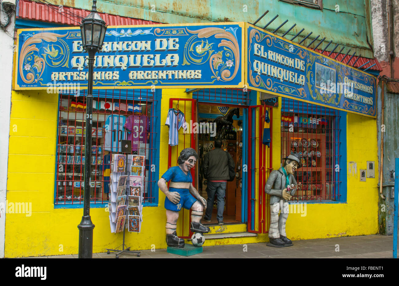 Buenos Aires Argentina La Boca colorful shops with statues and ...